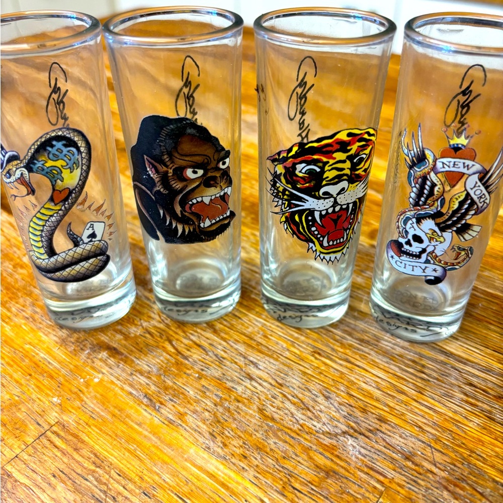 Brand new in box. Set of 4 Ed Hardy shot glasses